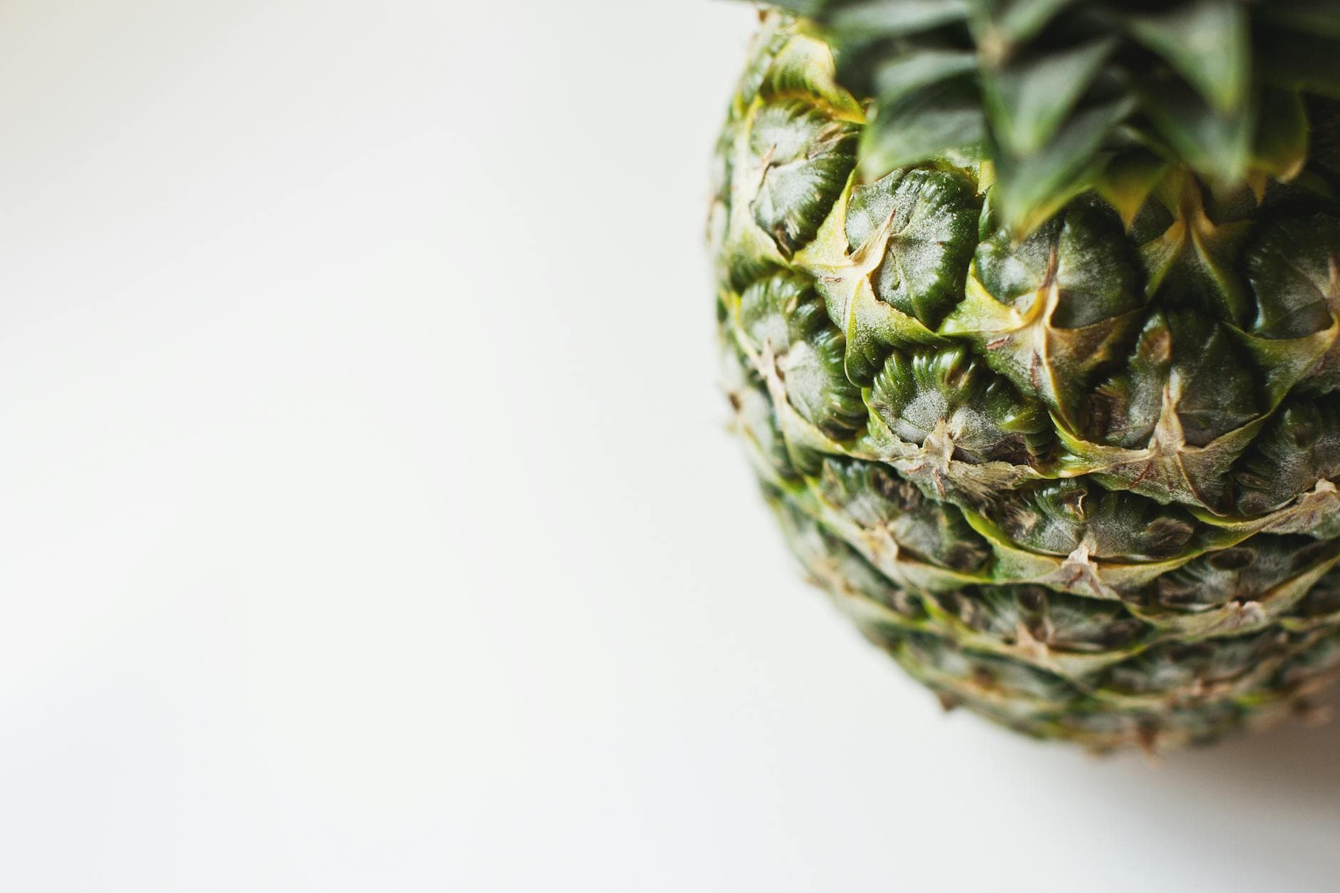 Detailed close-up of a fresh pineapple against a white background. Perfect for tropical themes. - anti inflammatory diet