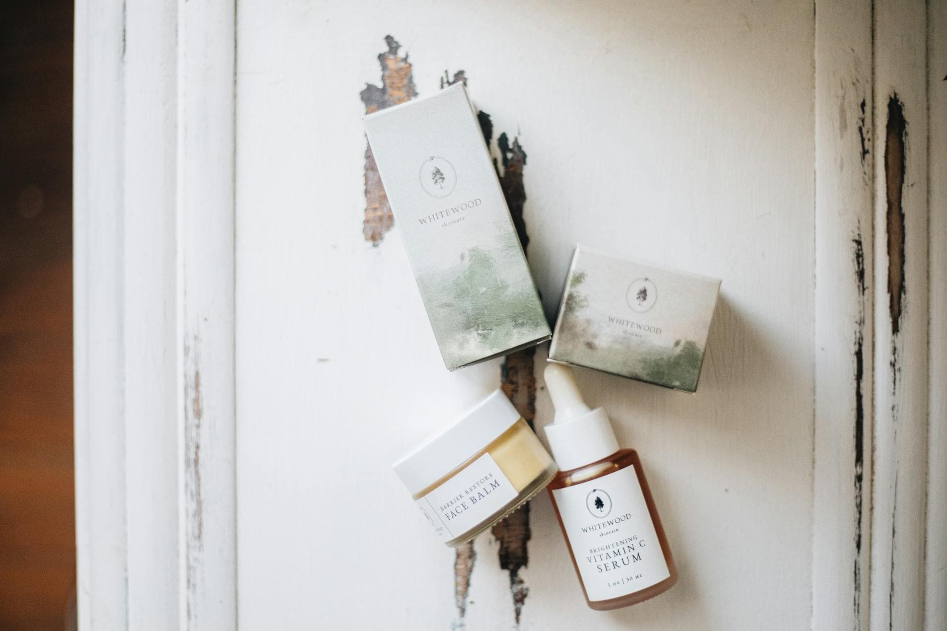 Elegant display of luxury skincare products with a natural, minimalist aesthetic. - spring skincare routine