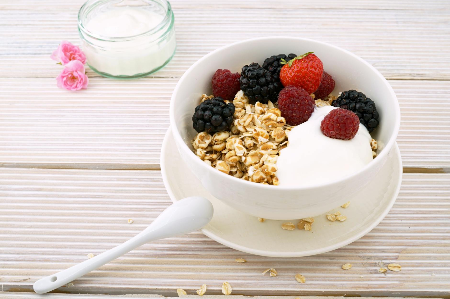 Delicious granola bowl topped with fresh berries and yogurt, perfect for a healthy breakfast. - healthy breakfast meal prep