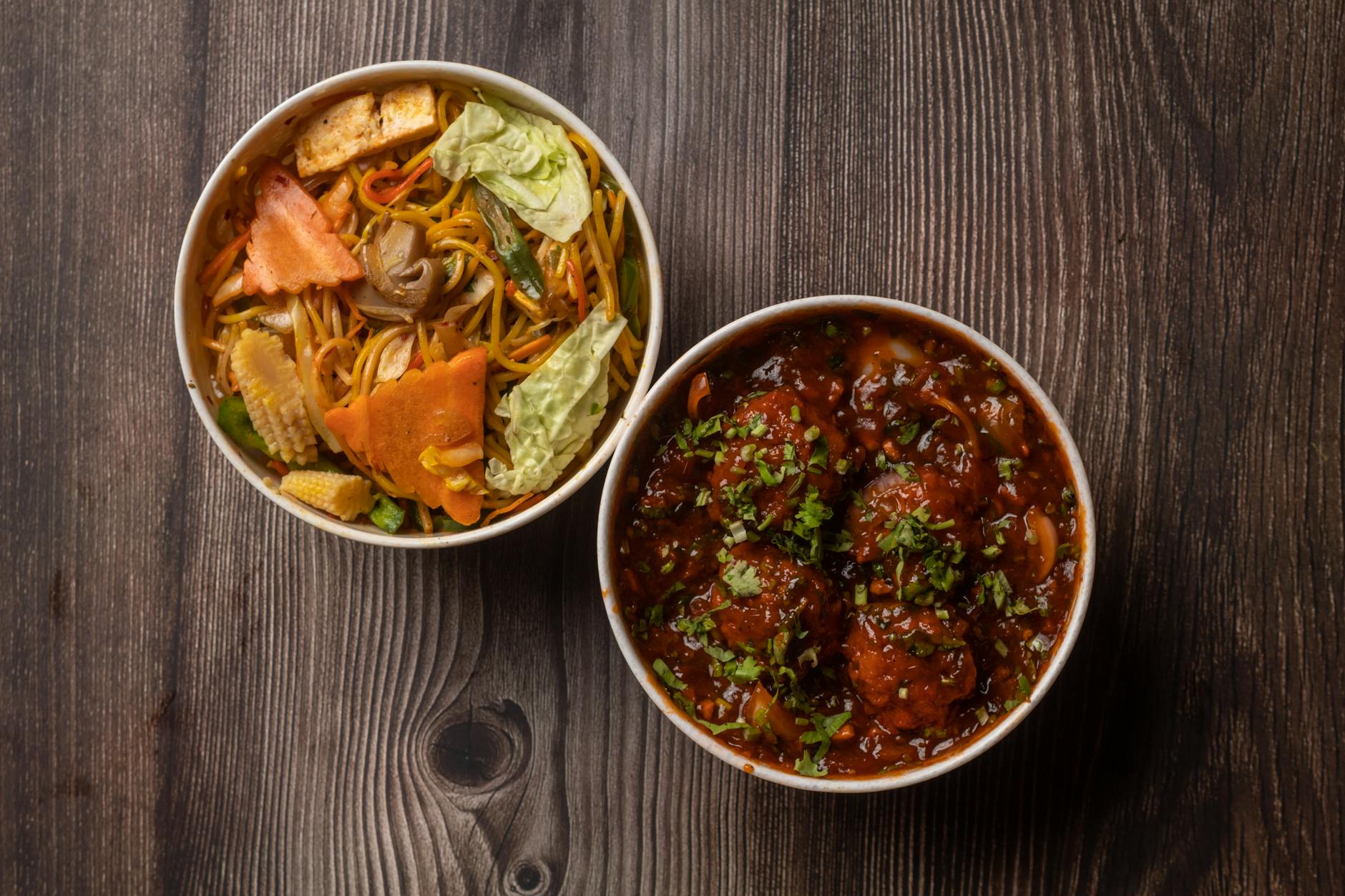 Indulge in a flavorful Indo-Chinese combo of vegetable noodles and spicy Manchurian for a delightful meal. - healthy dinners for two
