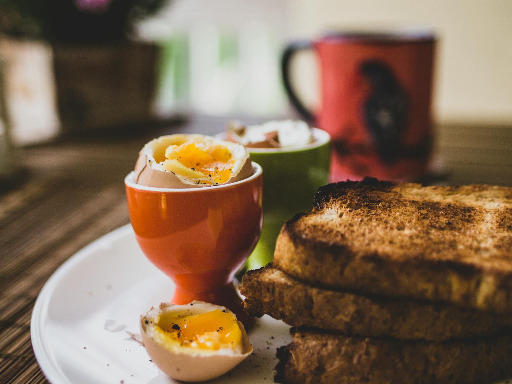 Delicious breakfast featuring soft-boiled eggs and toasted bread, perfect start to the day. - healthy mcdonalds breakfast