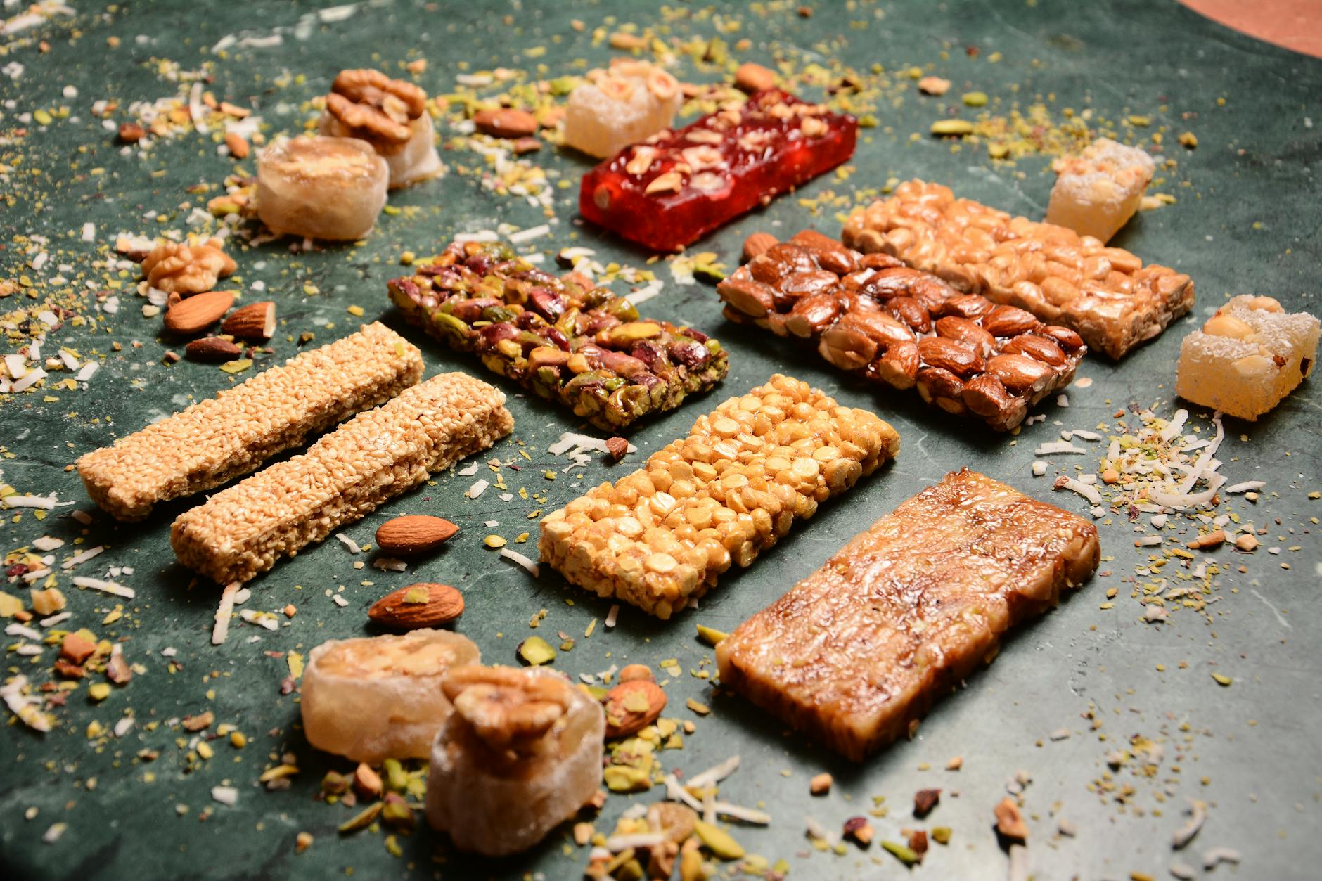 A variety of nut and seed bars showcasing delicious textures and flavors. - healthy sweet snacks