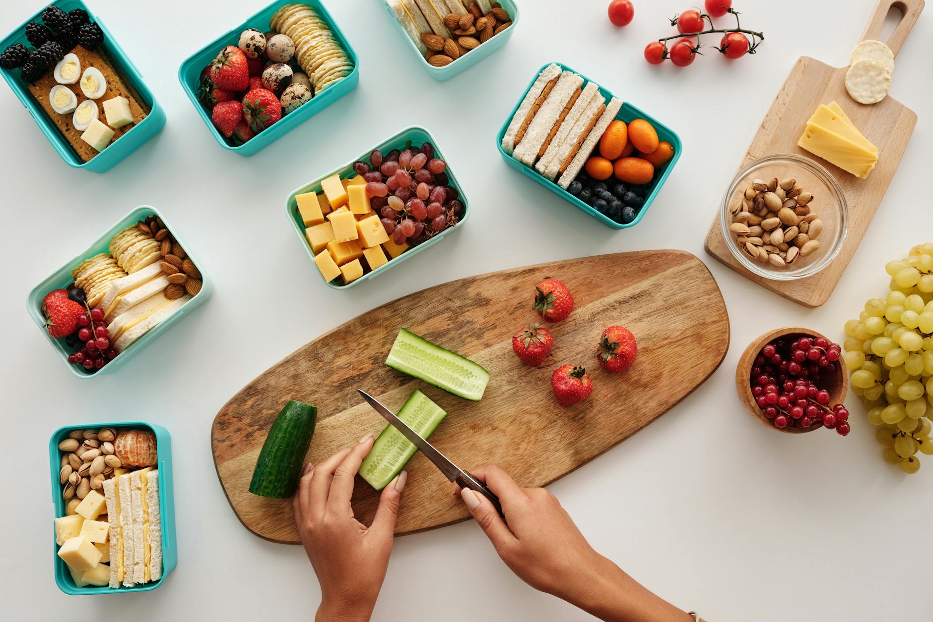 Overhead view of fresh fruit and vegetables being prepared for a healthy lunch. - keto meal plan