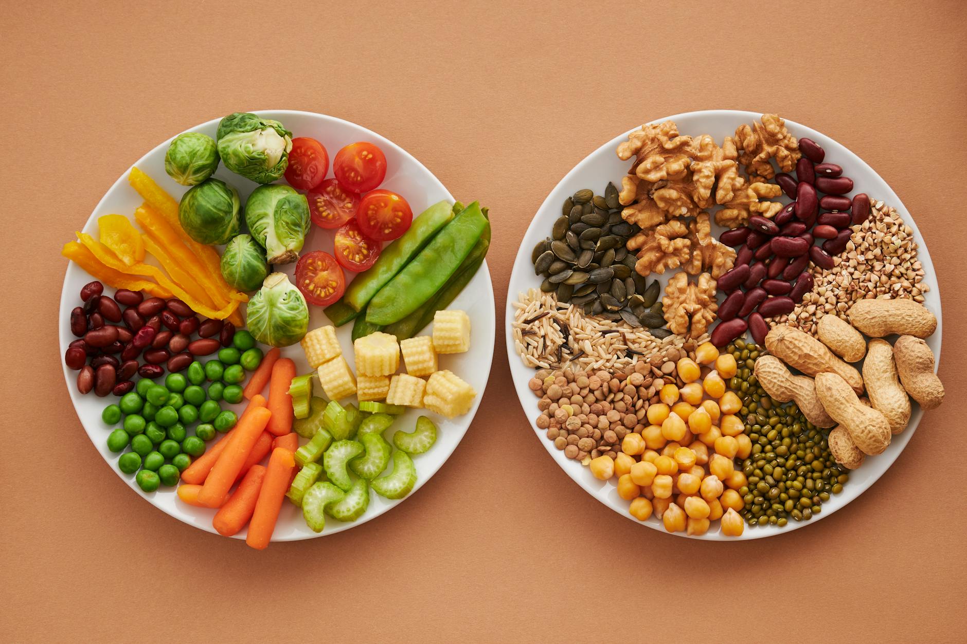 A vibrant flatlay of colorful vegetables and nuts showcasing a balanced diet concept. - protein fiber foods