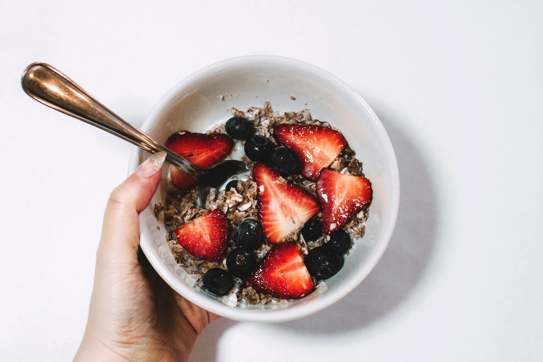 Fresh muesli with strawberries and blueberries, a perfect healthy breakfast. - quick healthy breakfast