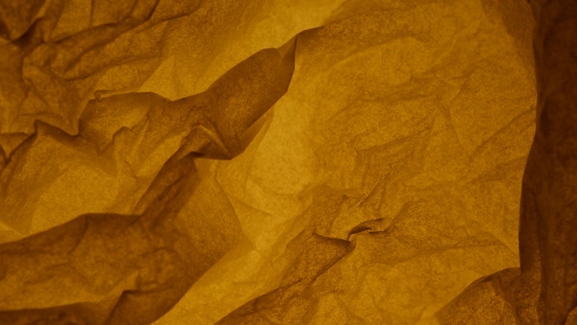 A close-up of a crumpled yellow paper providing an abstract texture. - spring mood disorders