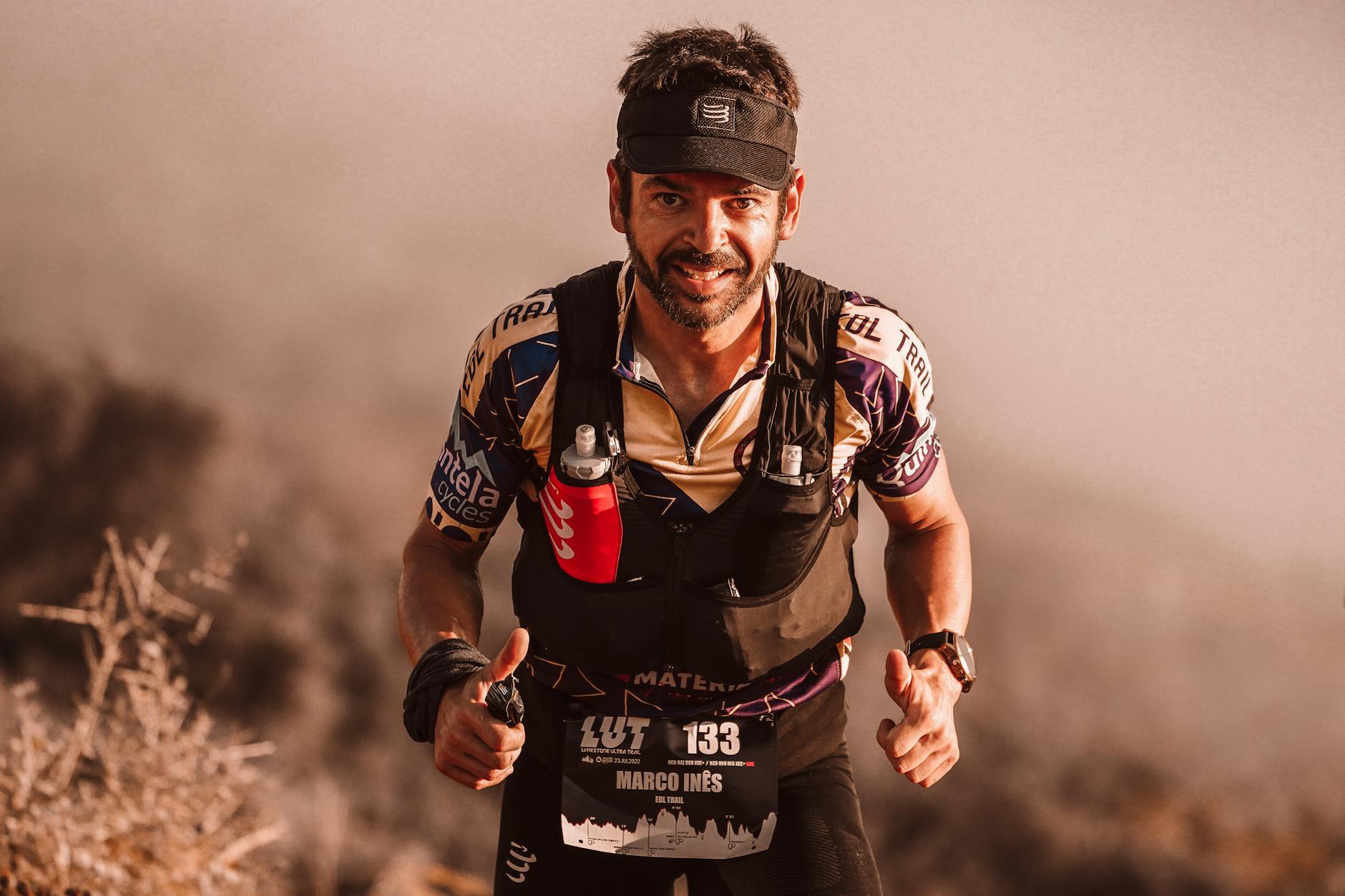 Determined trail runner participating in a race, showing perseverance and athleticism. - spring trail running