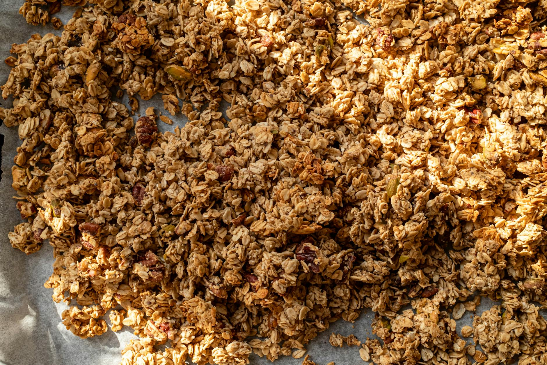 Crispy homemade granola with oats, nuts, and seeds, perfect for a healthy breakfast. - easy vegan recipes